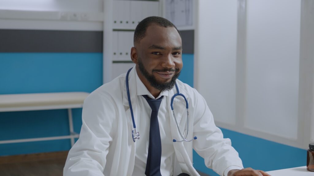 Portrait of african american therapist doctor analyzing sickness diagnostic document